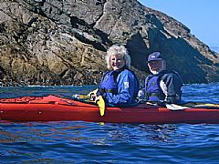 Previous visitors kayaking off Burra Isle, July 2012